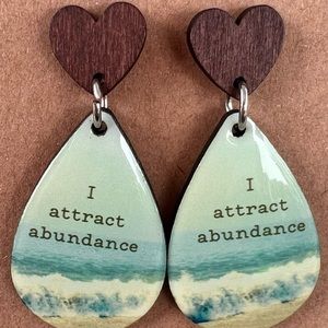 I attract abundance earrings. Handmade by me.
